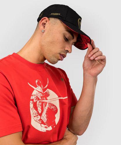 Gorra Venum x Assassin's Creed: Shadows (Negro / Dorado) (Disponible en Costa Rica y por Encargo)