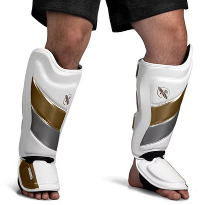 Espinilleras Hayabusa T3 Edición Striking (Blanco / Dorado) (Disponible por Encargo)
