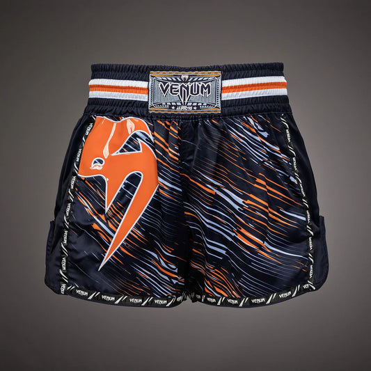 Fightshorts de Muay Thai Venum Giant (Negro / Anaranjado) (Disponible en Costa Rica y por Encargo)