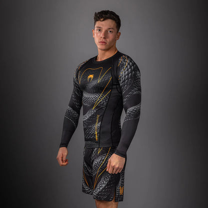 Rashguard Manga Larga Venum Matupa (Negro / Dorado) (Disponible en Costa Rica)
