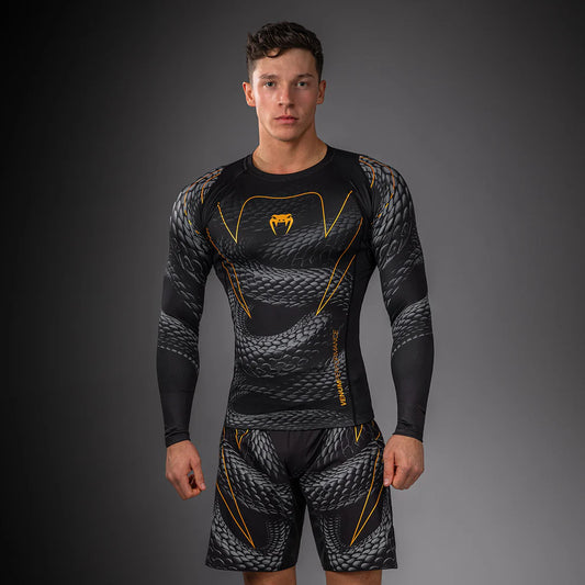 Rashguard Manga Larga Venum Matupa (Negro / Dorado) (Disponible en Costa Rica)