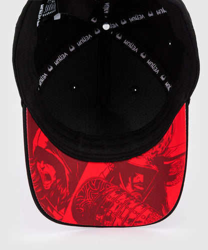 Gorra Venum x Assassin's Creed: Shadows (Negro / Dorado) (Disponible en Costa Rica y por Encargo)