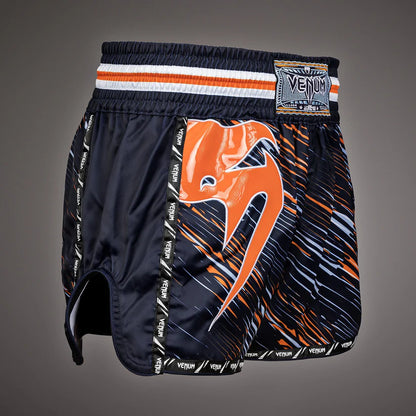 Fightshorts de Muay Thai Venum Giant (Negro / Anaranjado) (Disponible en Costa Rica y por Encargo)